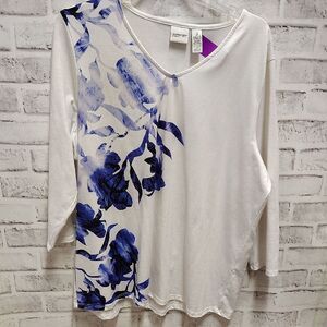 Chico's Blue and White Relaxed Blouse with Asymmetrical Floral Design